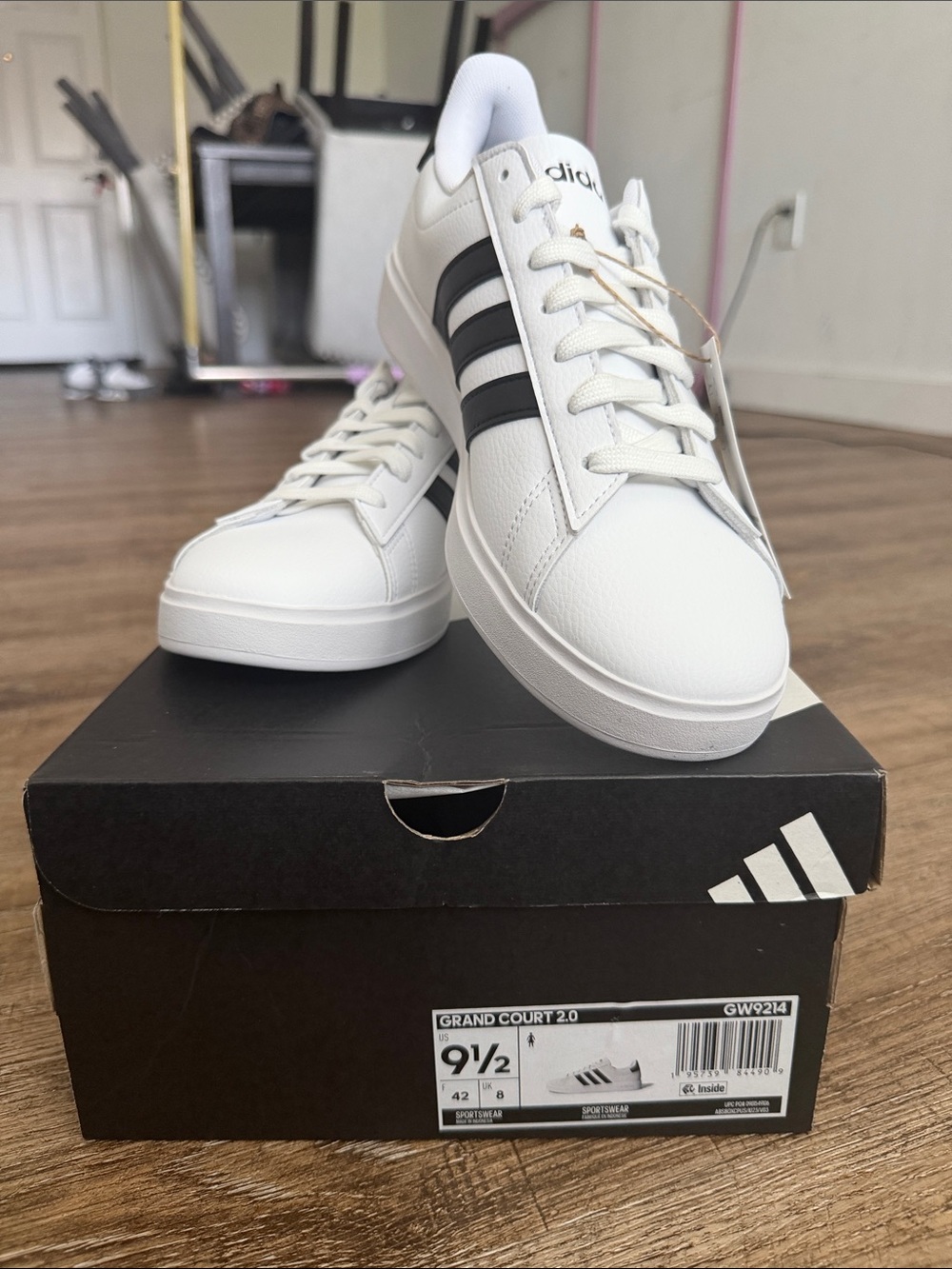 Brand new adidas White Sneakers with Black Three-Stripes